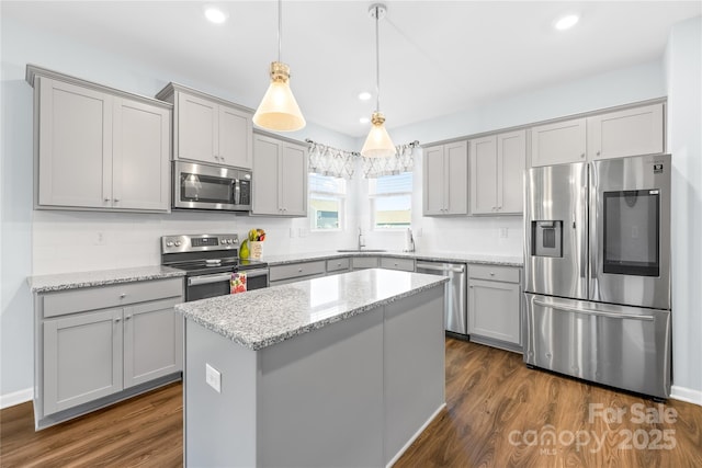 133 W Neel Ranch Rd, Mooresville, NC 28115 - kitchen with a sink, gray cabinets, stainless steel appliances, and dark wood-style floors