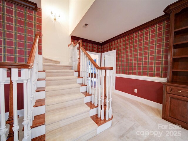 3015 Hamptonbrook Dr, Gastonia, NC 28056 - stairway featuring carpet flooring, ornamental molding, baseboards, and wallpapered walls