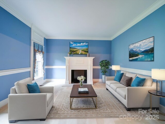 3015 Hamptonbrook Dr, Gastonia, NC 28056 - living room with crown molding, a fireplace, and baseboards
