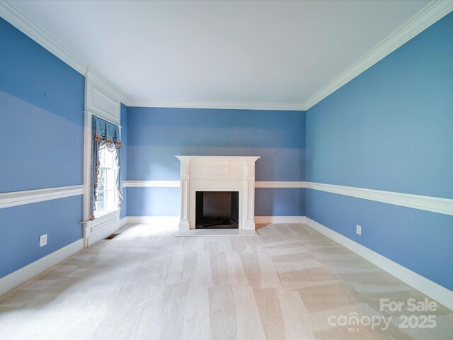 3015 Hamptonbrook Dr, Gastonia, NC 28056 - unfurnished living room featuring carpet, crown molding, a fireplace with flush hearth, and baseboards