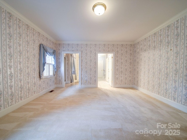 3015 Hamptonbrook Dr, Gastonia, NC 28056 - spare room featuring carpet flooring, crown molding, baseboards, and wallpapered walls