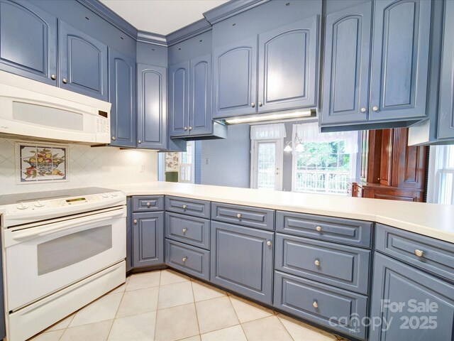 3015 Hamptonbrook Dr, Gastonia, NC 28056 - kitchen with white appliances, light countertops, light tile patterned floors, backsplash, and ornamental molding