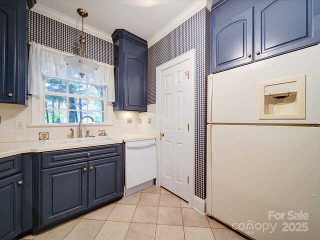 3015 Hamptonbrook Dr, Gastonia, NC 28056 - kitchen featuring white appliances, ornamental molding, a sink, and blue cabinets