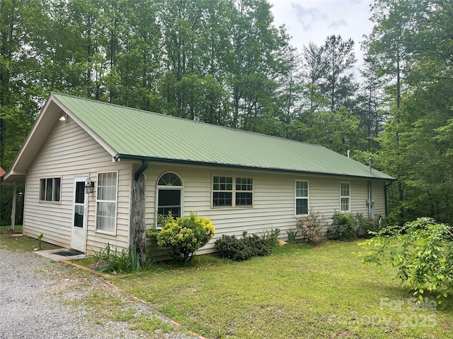 671 High Valley Rd, Bryson City, NC 28713 - single story home with a front lawn and metal roof