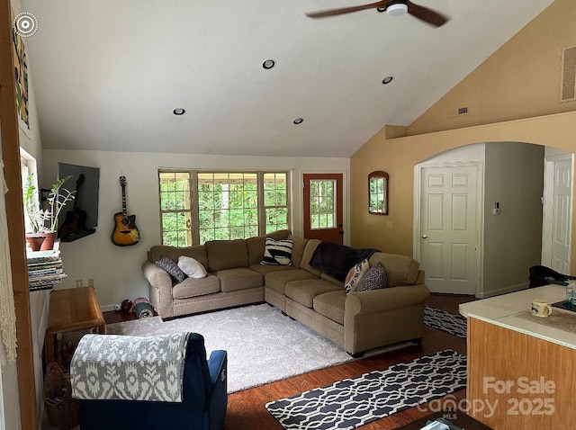 671 High Valley Rd, Bryson City, NC 28713 - living area with ceiling fan, visible vents, arched walkways, wood finished floors, and high vaulted ceiling