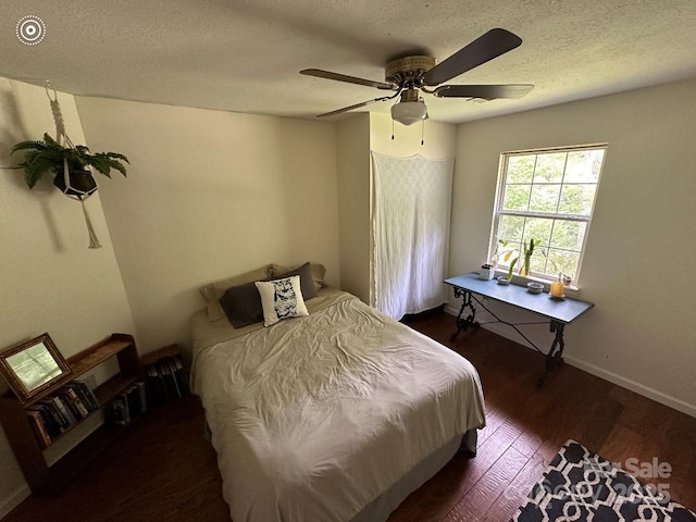 671 High Valley Rd, Bryson City, NC 28713 - bedroom featuring baseboards, ceiling fan, a textured ceiling, and wood finished floors