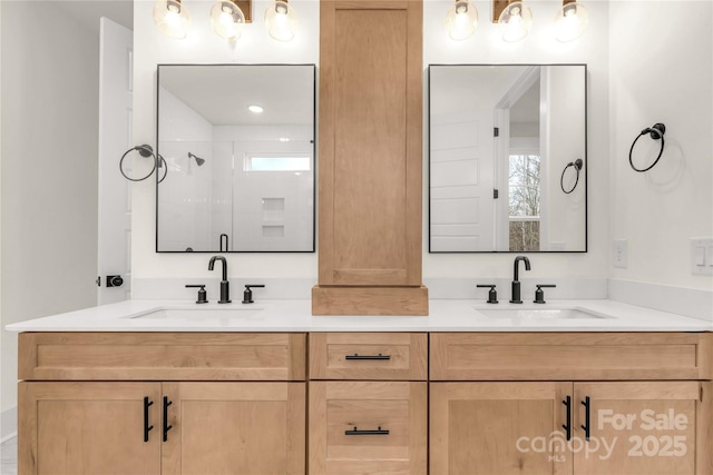 4095 Kingfisher Dr, York, SC 29745 - bathroom featuring double vanity, a sink, and a stall shower