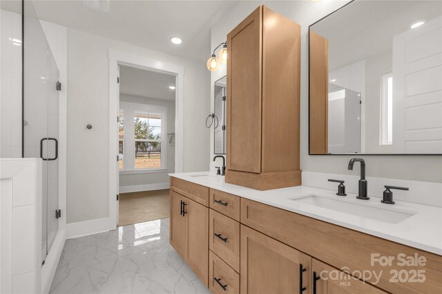 4095 Kingfisher Dr, York, SC 29745 - full bath with a sink, baseboards, a stall shower, and marble finish floor