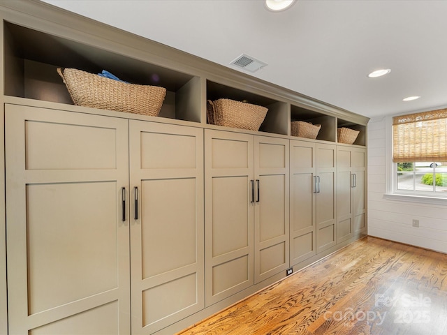 mudroom with light wood-type flooring and recessed lighting