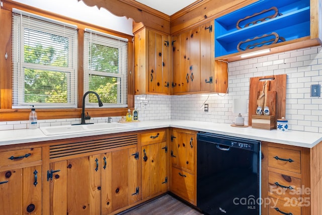 3418 Sulphur Springs Rd NE, Hickory, NC 28601 - kitchen with dishwasher, a sink, decorative backsplash, light countertops, and brown cabinetry