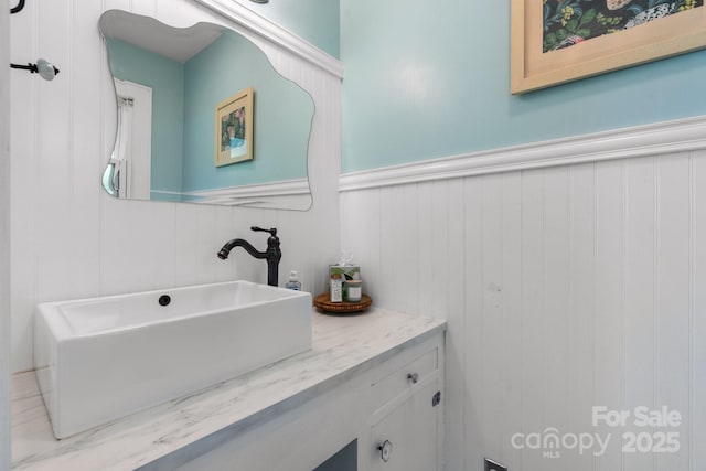 3418 Sulphur Springs Rd NE, Hickory, NC 28601 - bathroom with vanity and wainscoting