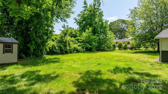 3418 Sulphur Springs Rd NE, Hickory, NC 28601 - view of green lawn featuring an outdoor structure