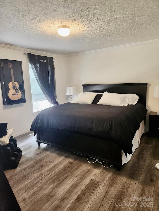 2025 Kisatchie Dr, Hickory Grove, SC 29717 - bedroom featuring wood finished floors, ornamental molding, and a textured ceiling