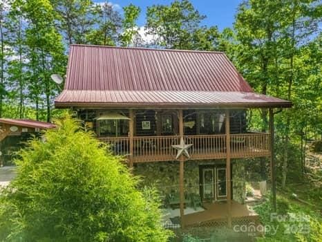 back of property with metal roof