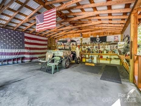 garage with a workshop area