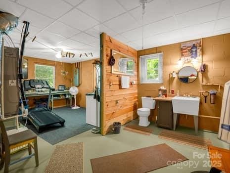 323 Acorn Ln Unit 6, 5, Rutherfordton, NC 28139 - bathroom featuring a drop ceiling, toilet, and a sink