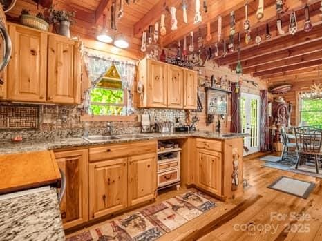 323 Acorn Ln Unit 6, 5, Rutherfordton, NC 28139 - kitchen featuring a sink, light wood finished floors, wooden ceiling, tasteful backsplash, and beamed ceiling