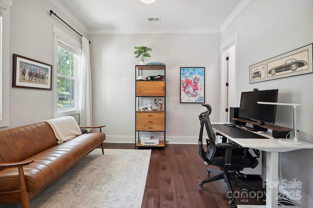 office with visible vents, ornamental molding, dark wood finished floors, and baseboards