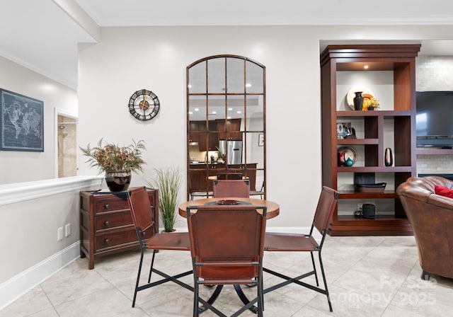 435 S Tryon St Unit 601, Charlotte, NC 28202 - dining area with ornamental molding and baseboards