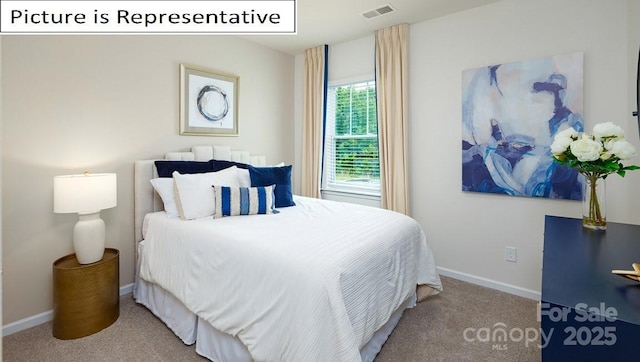 bedroom featuring baseboards, visible vents, and carpet