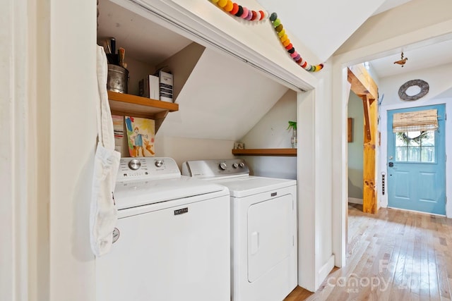 102 Altamahaw Ave, Black Mountain, NC 28711 - laundry room featuring washer and clothes dryer and light wood finished floors