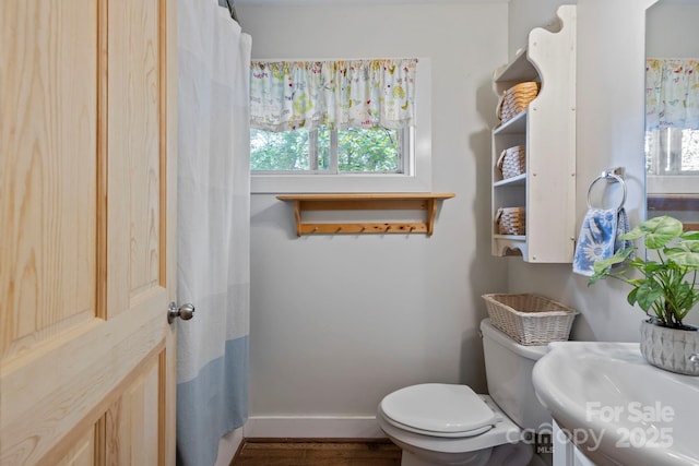 102 Altamahaw Ave, Black Mountain, NC 28711 - full bathroom with baseboards, toilet, and wood finished floors
