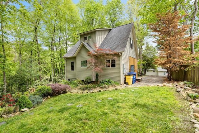 102 Altamahaw Ave, Black Mountain, NC 28711 - back of property with roof with shingles and a yard