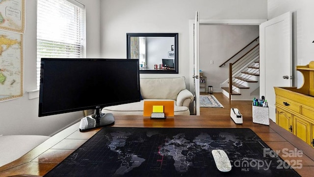interior space with stairs and wood finished floors