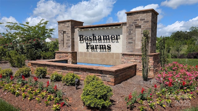 view of community sign