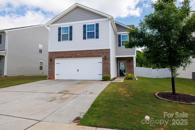 316 Gaines Rd, Clover, SC 29710 - view of front of home featuring brick siding, a garage, and driveway