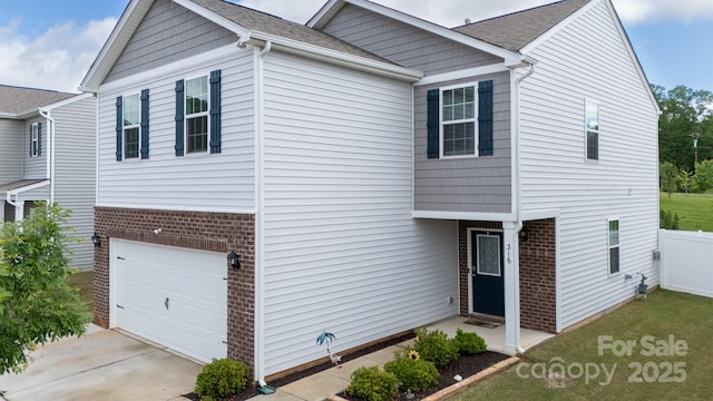 316 Gaines Rd, Clover, SC 29710 - traditional home with an attached garage, concrete driveway, and brick siding
