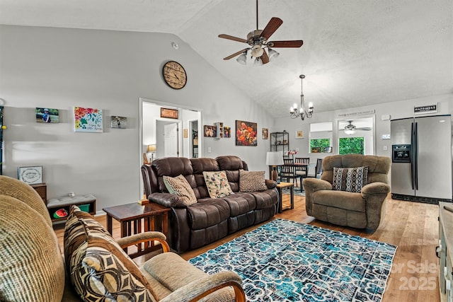3690 Birchwood Ln, Denver, NC 28037 - living room with ceiling fan, a chandelier, light wood-style flooring, and high vaulted ceiling