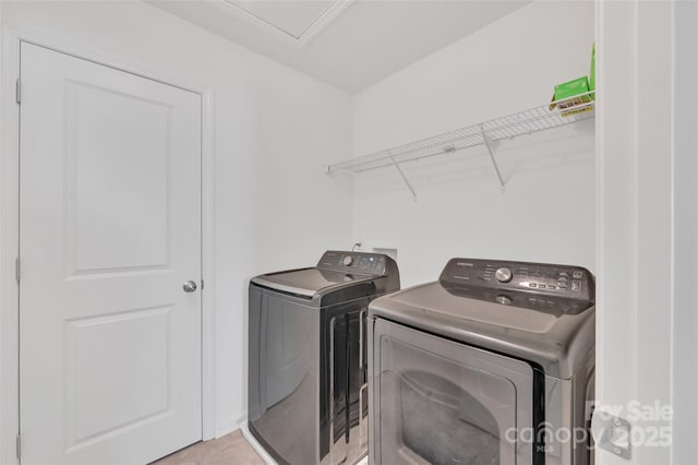 12110 Chesapeake Mallard Dr, Charlotte, NC 28262 - washroom with washer and clothes dryer