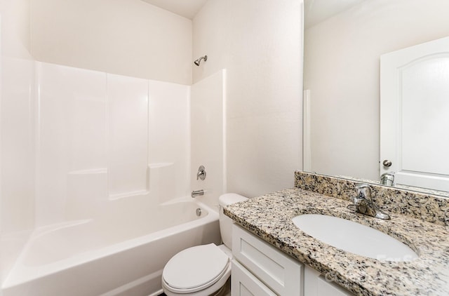 bathroom featuring vanity, shower / bathtub combination, and toilet