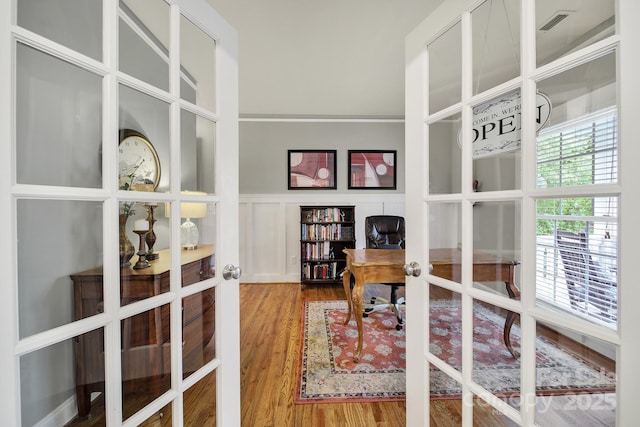 3426 Richards Xing, Fort Mill, SC 29708 - home office featuring french doors, wood finished floors, wainscoting, and a decorative wall