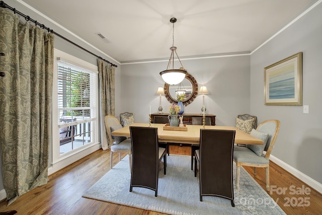 3426 Richards Xing, Fort Mill, SC 29708 - dining space with baseboards, wood finished floors, and crown molding