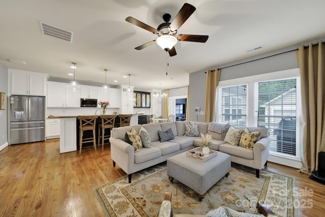 3426 Richards Xing, Fort Mill, SC 29708 - living area with a ceiling fan and light wood-style flooring