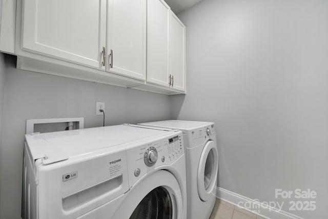 3426 Richards Xing, Fort Mill, SC 29708 - clothes washing area with cabinet space, washing machine and clothes dryer, baseboards, and light tile patterned flooring