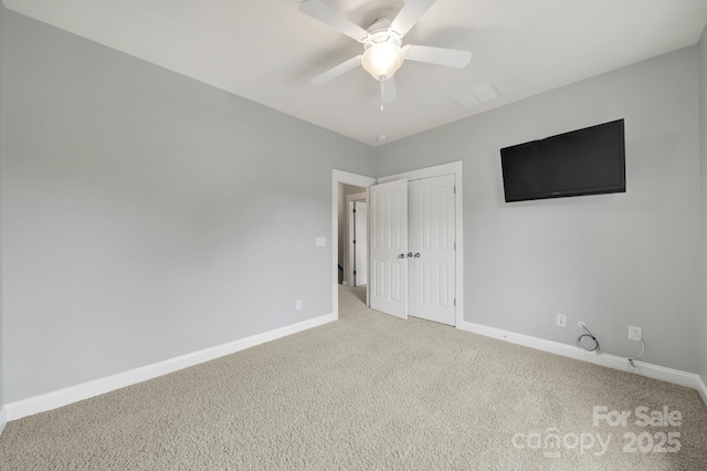 3426 Richards Xing, Fort Mill, SC 29708 - unfurnished bedroom with carpet floors, baseboards, a closet, and a ceiling fan