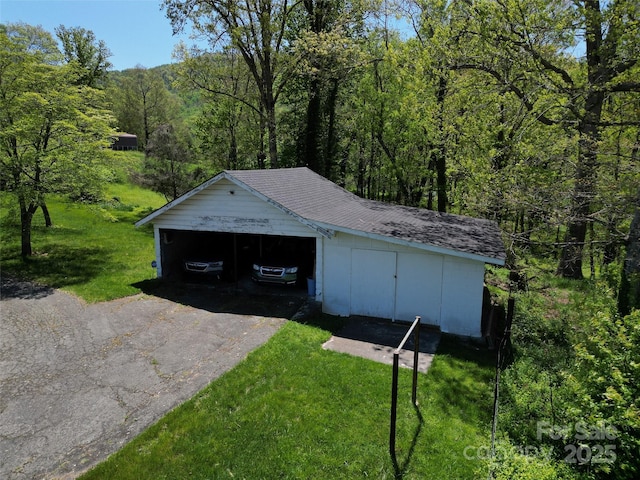 garage with a forest view