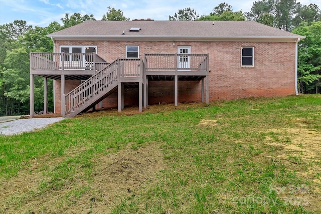 332 E Rebound Rd, Lancaster, SC 29720 - back of house featuring a deck, a yard, stairway, and brick siding