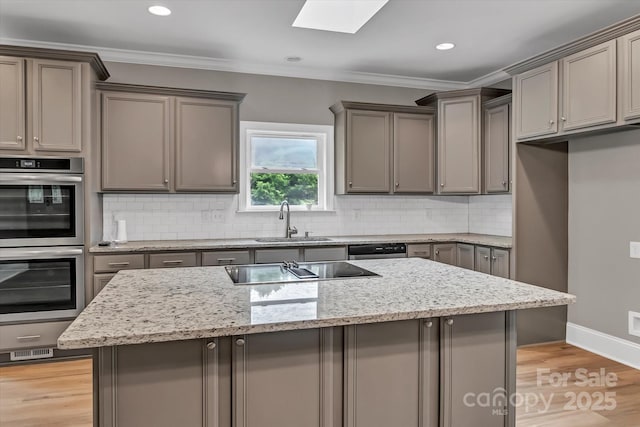 332 E Rebound Rd, Lancaster, SC 29720 - kitchen featuring stainless steel appliances, a sink, gray cabinetry, crown molding, and recessed lighting
