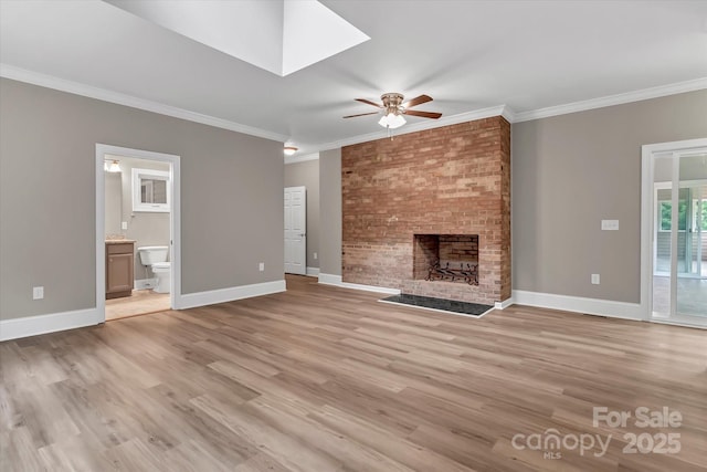 332 E Rebound Rd, Lancaster, SC 29720 - unfurnished living room featuring a ceiling fan, ornamental molding, a brick fireplace, light wood finished floors, and baseboards