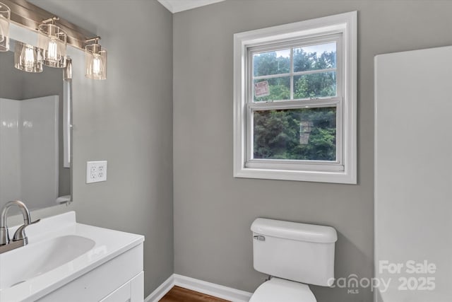 332 E Rebound Rd, Lancaster, SC 29720 - bathroom with toilet, baseboards, vanity, and wood finished floors
