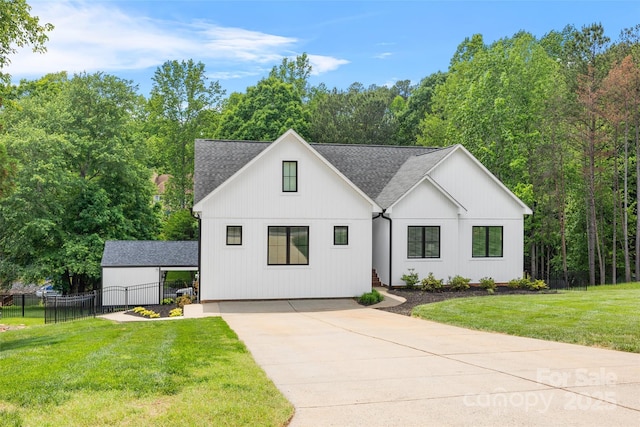 184 Quiet Cove Rd, Mooresville, NC 28117 - modern farmhouse with a shingled roof and concrete driveway