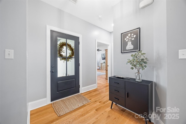 184 Quiet Cove Rd, Mooresville, NC 28117 - entryway with light wood-style flooring and baseboards