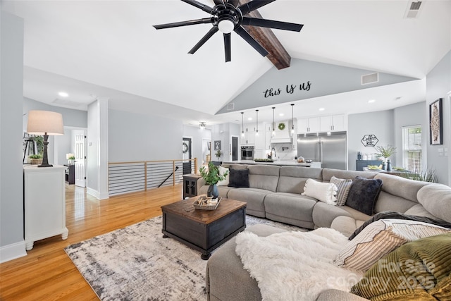 184 Quiet Cove Rd, Mooresville, NC 28117 - living room with a ceiling fan, beamed ceiling, light wood-type flooring, high vaulted ceiling, and recessed lighting
