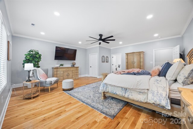 184 Quiet Cove Rd, Mooresville, NC 28117 - bedroom with recessed lighting, wood finished floors, baseboards, ceiling fan, and crown molding
