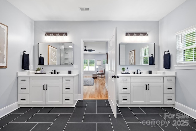 184 Quiet Cove Rd, Mooresville, NC 28117 - bathroom with ceiling fan, tile patterned flooring, and baseboards