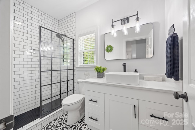 184 Quiet Cove Rd, Mooresville, NC 28117 - full bathroom featuring a stall shower, toilet, vanity, and tile patterned floors